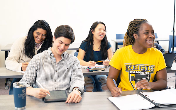 College students smile and enjoy class thanks to the flexibility and reduced costs their school offers through OCICU courses.